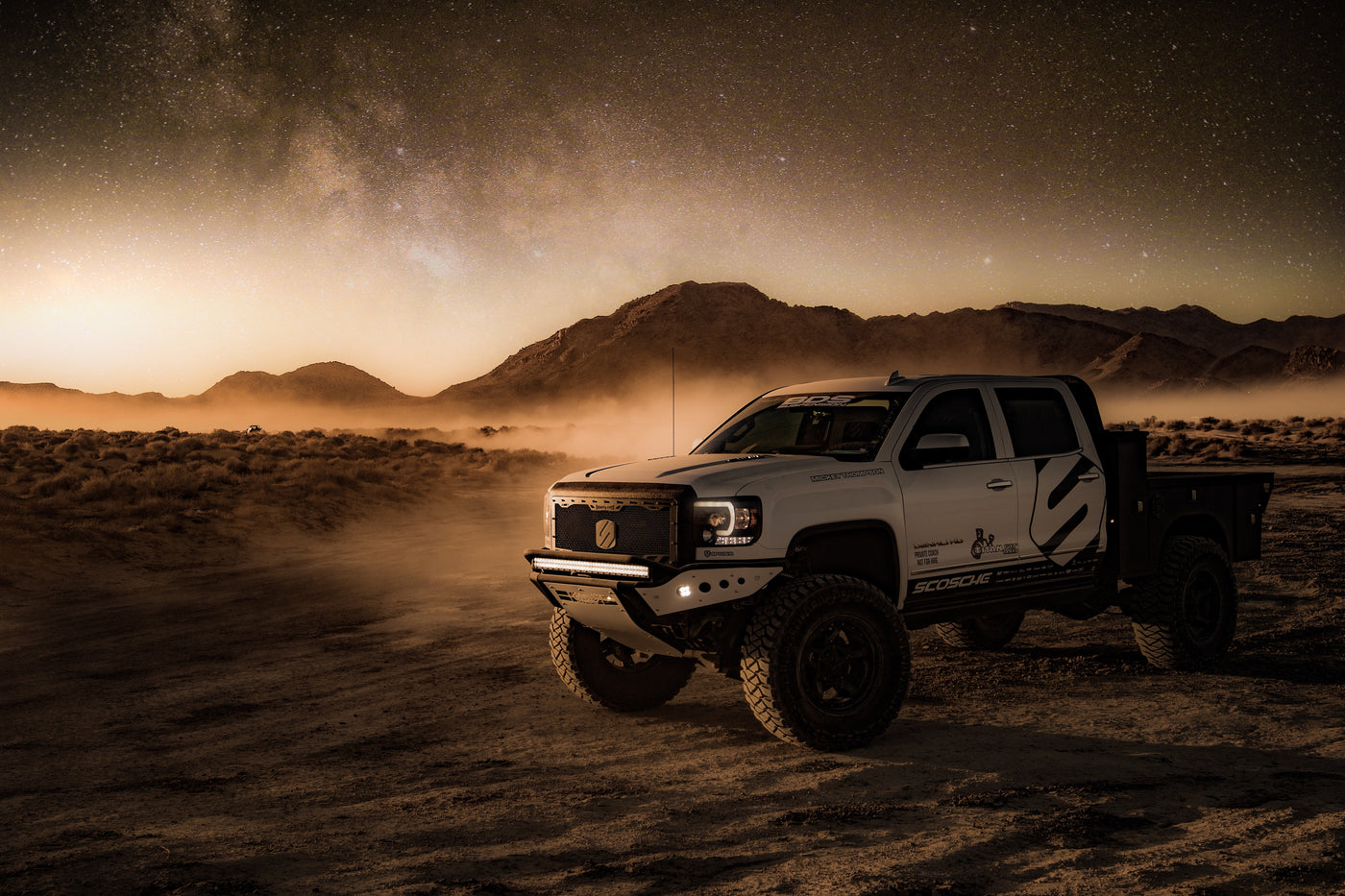 light bar on truck driving through desert